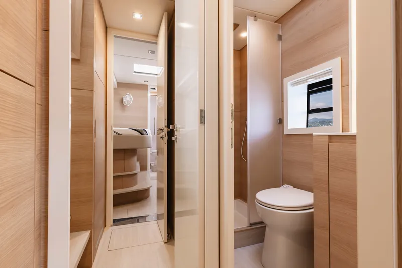 Slide: The Image of Luxurious bathroom interior of 2026 Aventura 56 Motor Yacht with modern fixtures and wood accents. - 30