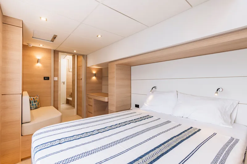 Slide: The Image of Luxurious bedroom interior of 2026 Aventura 56 Motor Yacht with modern design. - 23