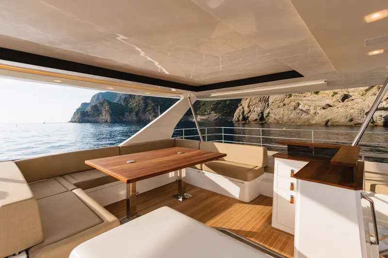 Slide: The Image of Luxurious interior of 2026 Aventura 56 Motor Yacht with scenic ocean view. - 38