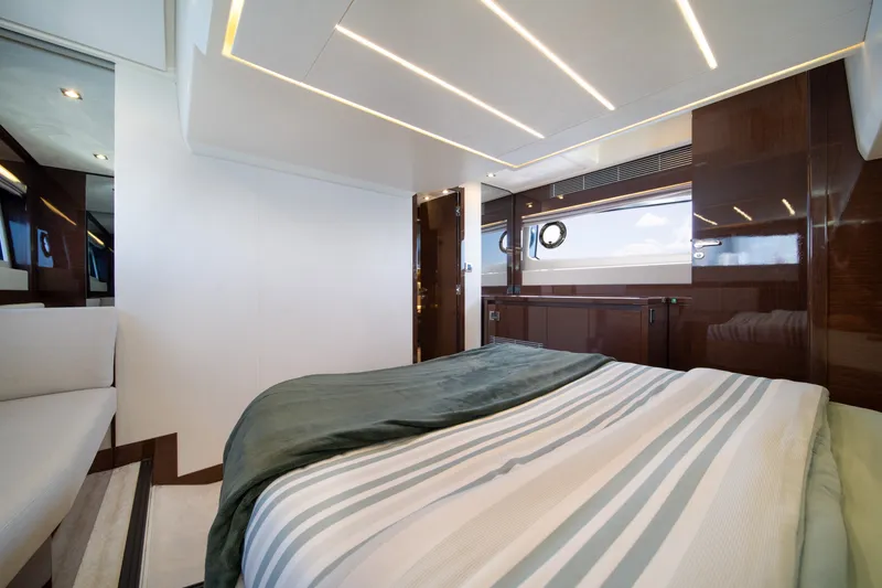Slide: The Image of Luxurious bedroom interior of 2020 Prestige 520 yacht with modern design and elegant finishes. - 21