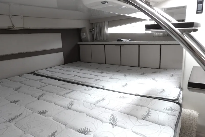 Slide: The Image of Interior cabin of 2018 Regal 33 XO yacht with comfortable bedding. - 31