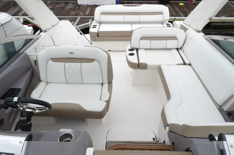 Slide: The Image of Luxurious interior of a 2018 Regal 33 XO boat with plush seating and modern design. - 20