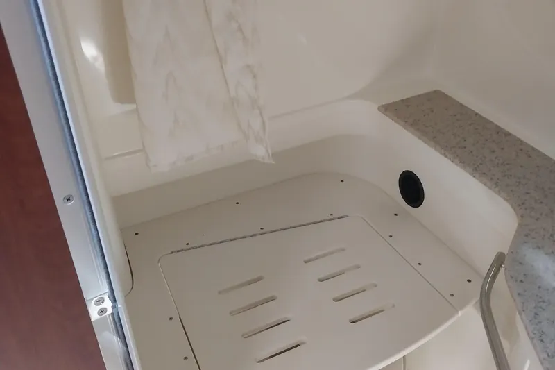 Slide: The Image of 2011 Monterey 340 Sport Yacht interior with shower and seating area. - 22