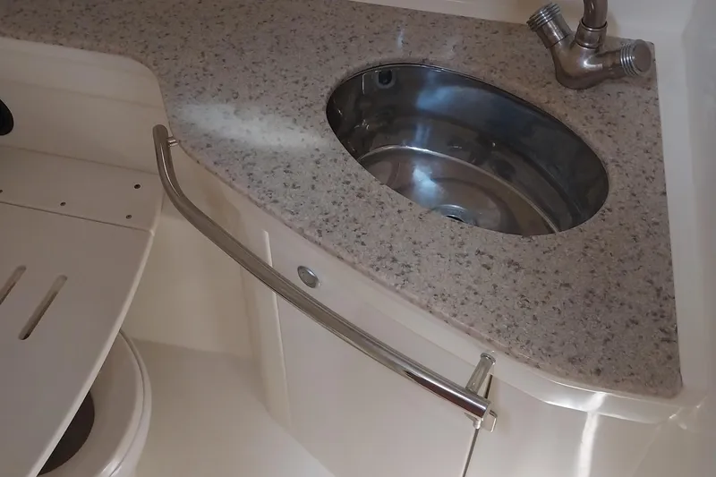 Slide: The Image of 2011 Monterey 340 Sport Yacht sink with granite countertop and modern faucet. - 21