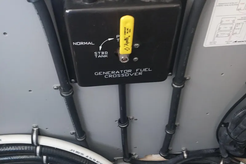 Slide: The Image of Generator fuel crossover panel on a 2011 Monterey 340 Sport Yacht. - 30