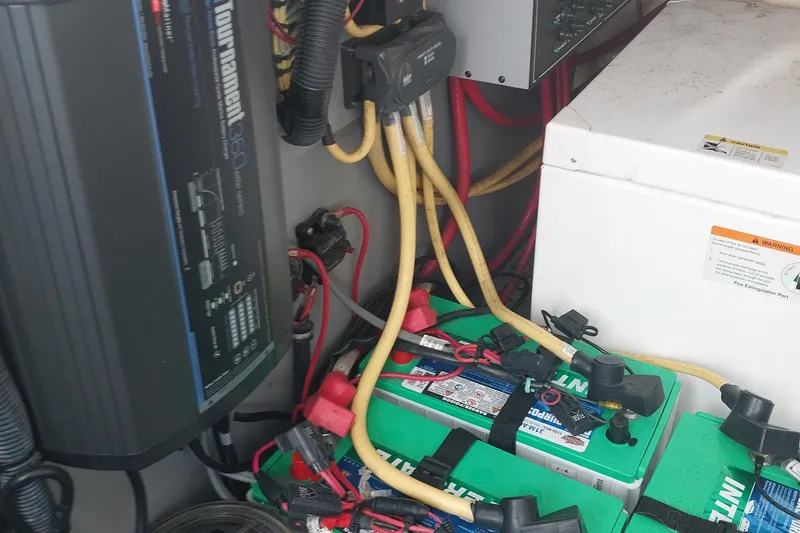 Slide: The Image of Electrical system of a 2011 Monterey 340 Sport Yacht with batteries and wiring. - 29