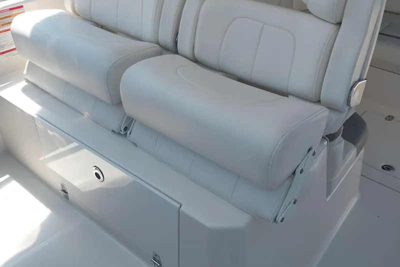 Slide: The Image of Luxurious white seating on a 2011 Monterey 340 Sport Yacht. - 7