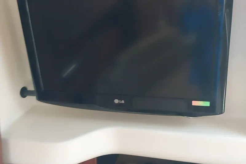 Slide: The Image of LG TV mounted inside a 2011 Monterey 340 Sport Yacht. - 14