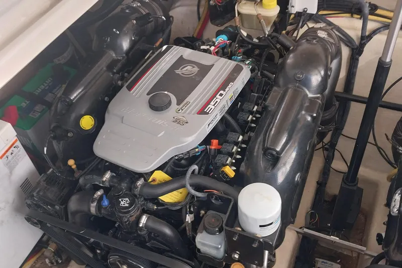 Slide: The Image of Engine of a 2011 Monterey 340 Sport Yacht, showcasing detailed components and layout. - 27