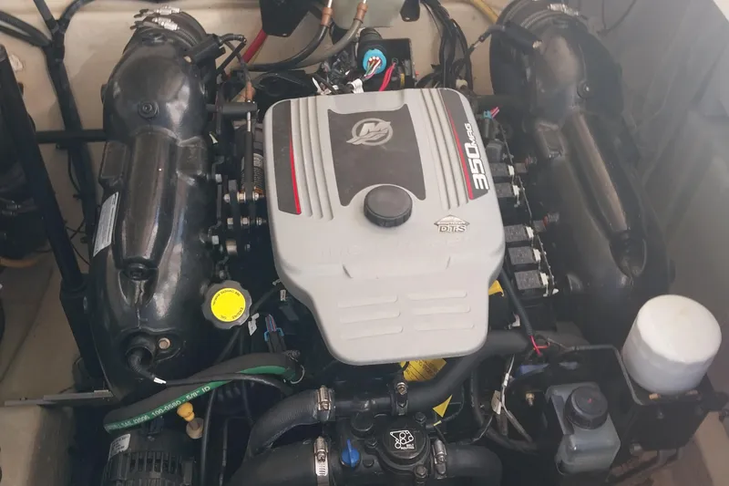 Slide: The Image of Engine of a 2011 Monterey 340 Sport Yacht, showcasing detailed components and layout. - 26