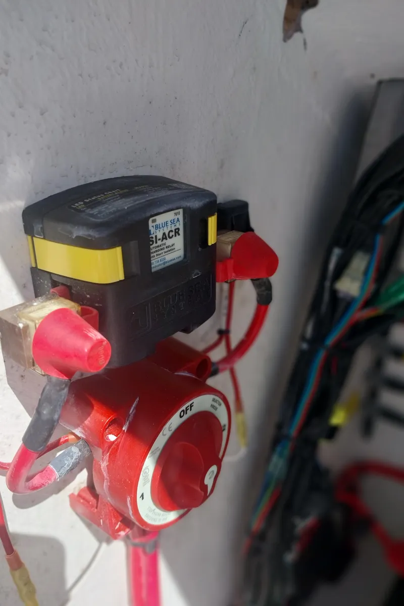 Slide: The Image of Electrical components on a 2024 Savage Seas Shallow Bay SS22 boat. - 11