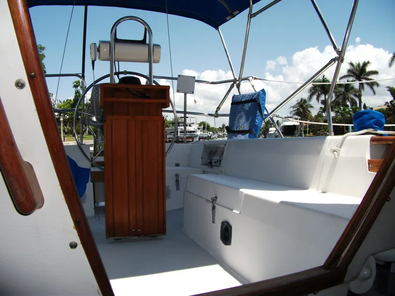 Slide: The Image of Cockpit of 1992 Catalina 30 MkII sailboat with wooden helm and seating. - 25