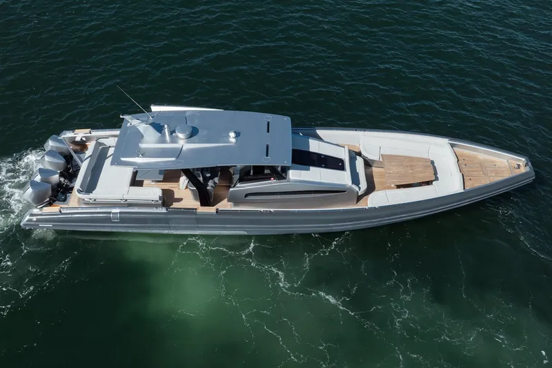 Slide: The Image of 2022 Novamarine BS 160 Outboard luxury boat cruising on open water. - 10