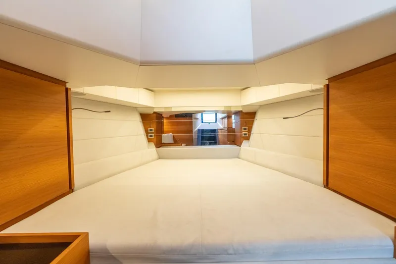 Slide: The Image of 2021 Wally 48 Wally Tender interior cabin with modern wood and white design. - 42