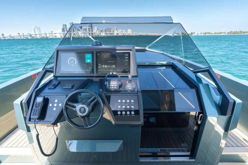 Slide: The Image of Helm of 2021 Wally 48 Wally Tender yacht with modern navigation controls. - 25