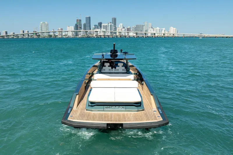 Slide: The Image of 2021 Wally 48 Wally Tender yacht cruising near city skyline. - 21