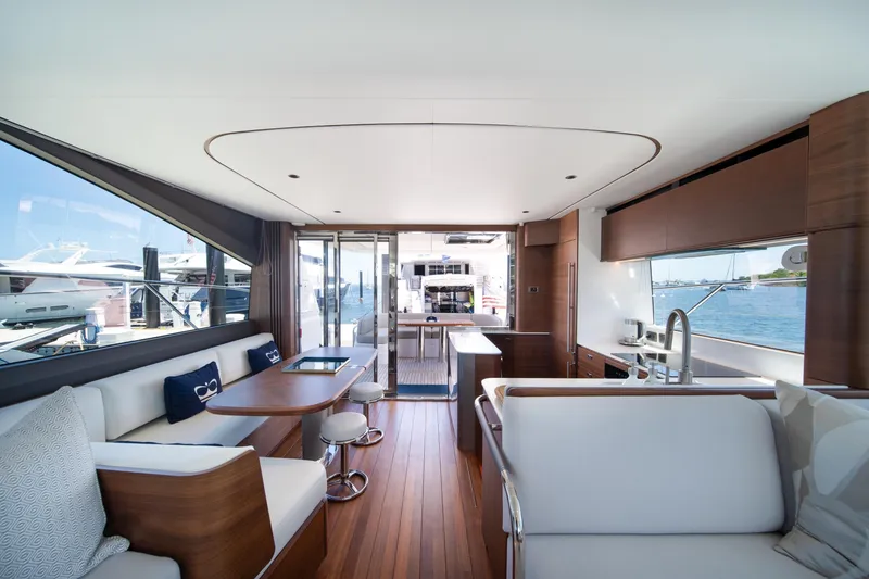 Slide: The Image of Luxurious interior of 2025 Princess F65 yacht with modern design and waterfront view. - 14