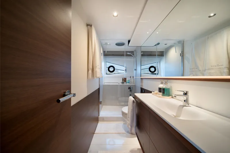 Slide: The Image of Luxurious bathroom interior of 2025 Princess F65 yacht, featuring modern fixtures and elegant design. - 25