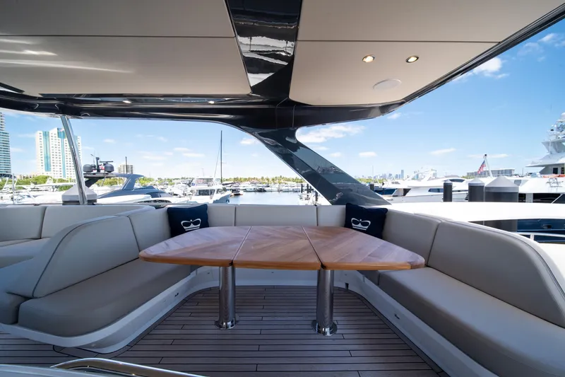 Slide: The Image of Luxurious 2025 Princess F65 yacht interior with elegant seating and marina view. - 46
