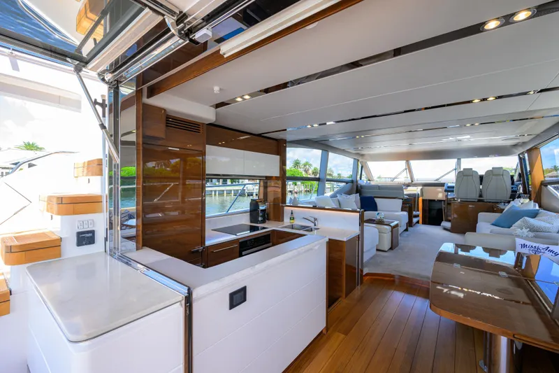Slide: The Image of Luxurious interior of 2020 Princess F70 yacht with modern kitchen and spacious seating area. - 30