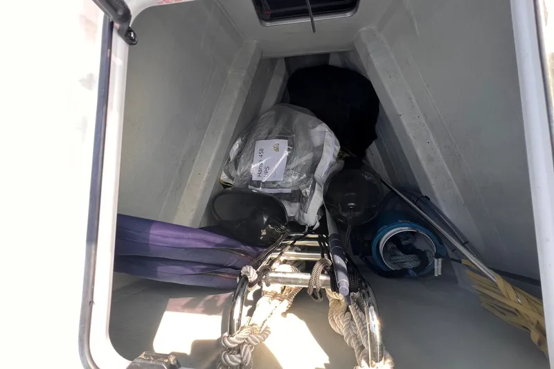 Slide: The Image of Storage compartment of a 2020 Hanse 458 yacht with sailing gear and equipment. - 11