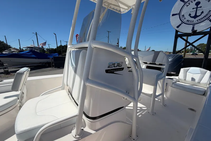 Slide: The Image of 2024 Robalo 206 Cayman boat interior with seating and console details. - 29