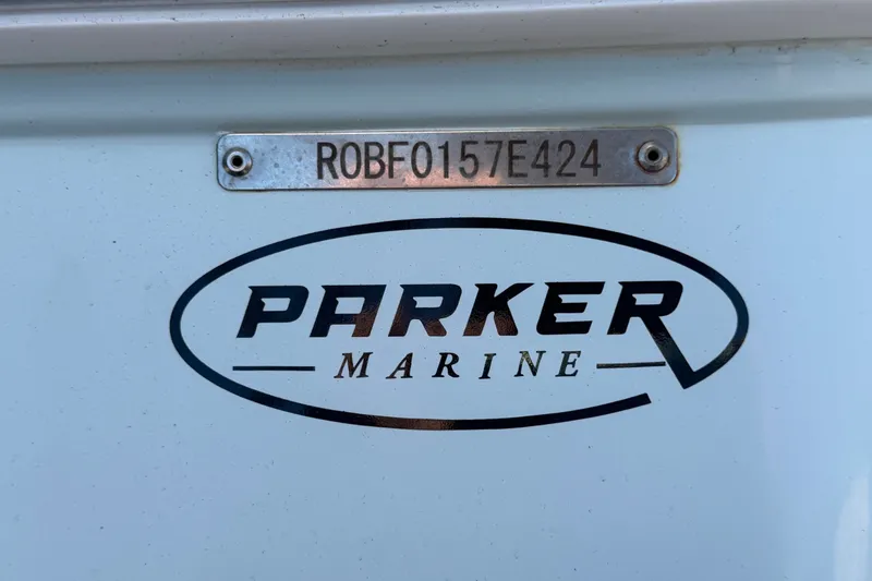 Slide: The Image of 2024 Robalo 206 Cayman boat with Parker Marine logo and serial number plate. - 36