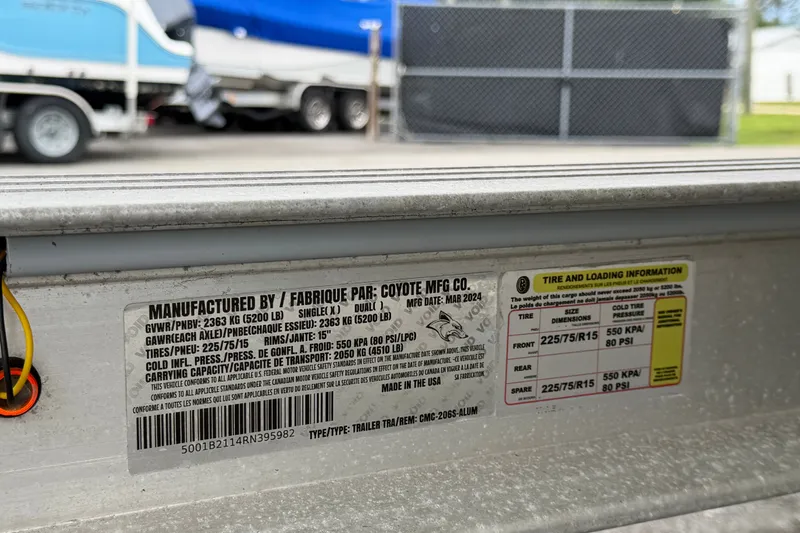 Slide: The Image of Label on a 2024 Robalo 206 Cayman trailer, showing tire and loading information. - 66