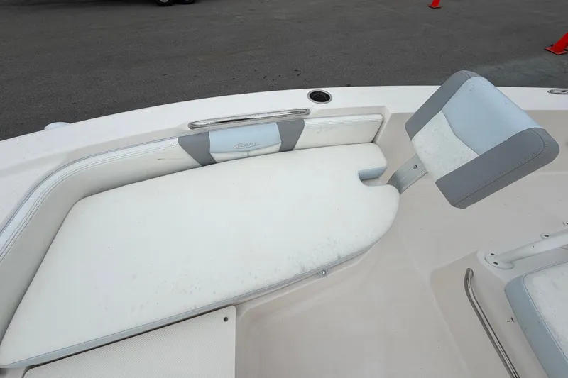 Slide: The Image of 2024 Robalo 206 Cayman boat interior with white and gray seating. - 30