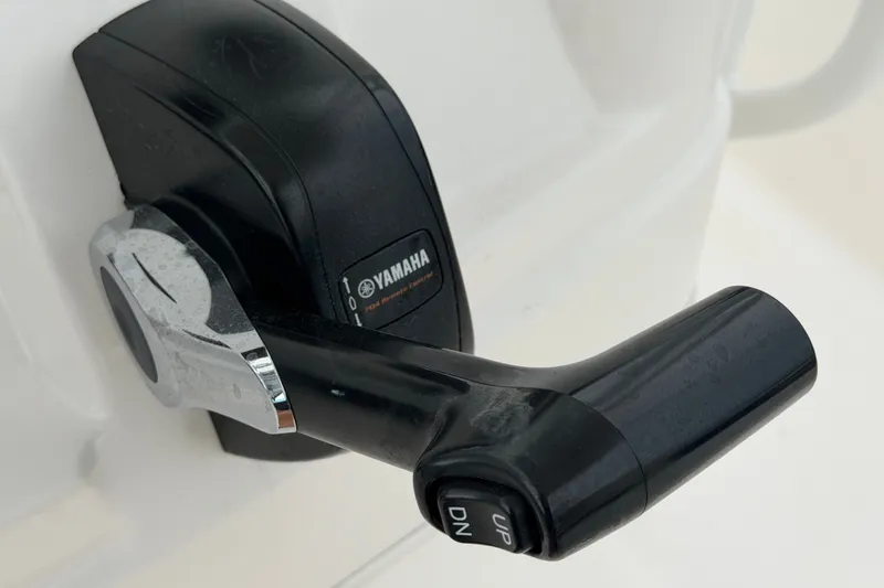 Slide: The Image of Close-up of Yamaha throttle control on 2024 Robalo 206 Cayman boat. - 22