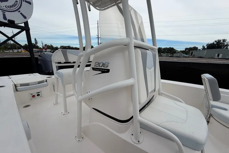 Slide: The Image of 2024 Robalo 206 Cayman boat interior with seating and console details. - 43