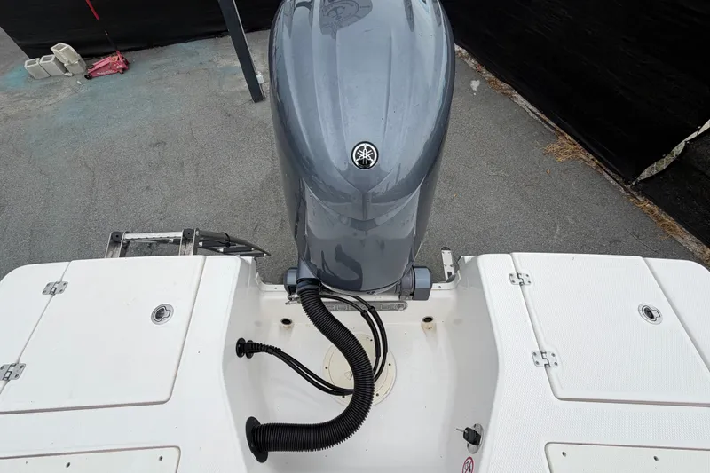 Slide: The Image of 2024 Robalo 206 Cayman boat with Yamaha outboard motor, rear view. - 63