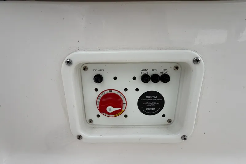 Slide: The Image of Control panel on 2024 Robalo 206 Cayman boat with switches and digital relay. - 49
