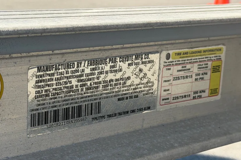 Slide: The Image of Label on a 2024 Robalo 206 Cayman trailer, detailing tire and loading specifications. - 37