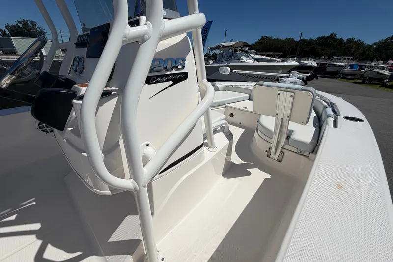 Slide: The Image of 2024 Robalo 206 Cayman boat interior with seating and console details. - 22