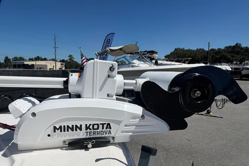 Slide: The Image of Minn Kota Terrova motor on 2024 Robalo 206 Cayman boat, outdoor display. - 24