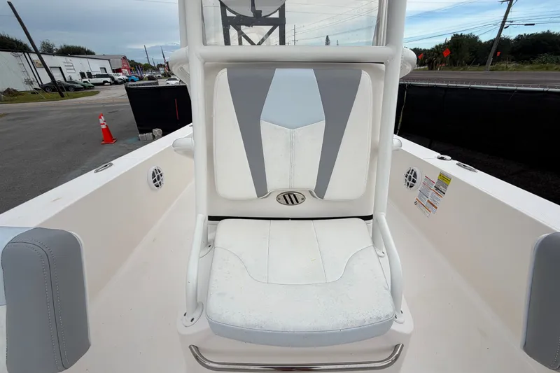 Slide: The Image of 2024 Robalo 206 Cayman boat seat with white and gray upholstery. - 40