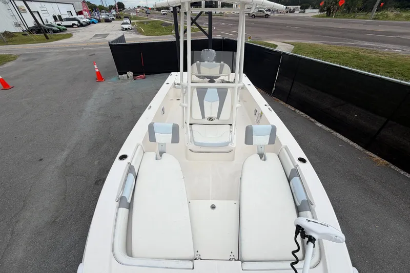 Slide: The Image of 2024 Robalo 206 Cayman boat interior with seating and fishing equipment. - 37