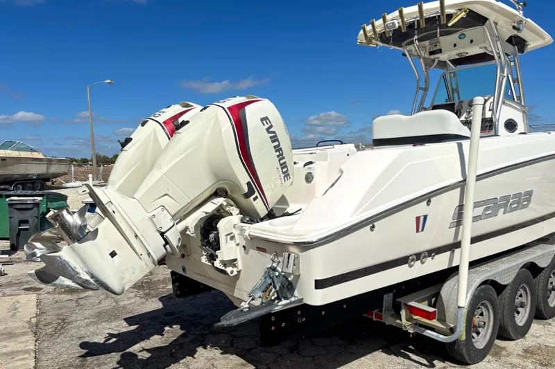 Slide: The Image of Wellcraft 30 Scarab Sport 2013 avec moteurs Evinrude sur remorque. - 4