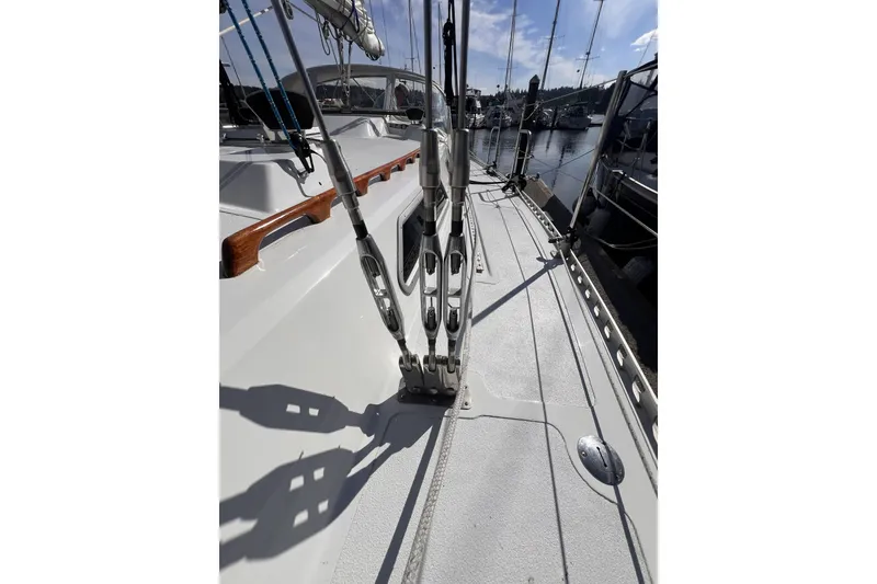 Slide: The Image of 1981 Nordic Boats 40 deck view with rigging and marina background. - 30