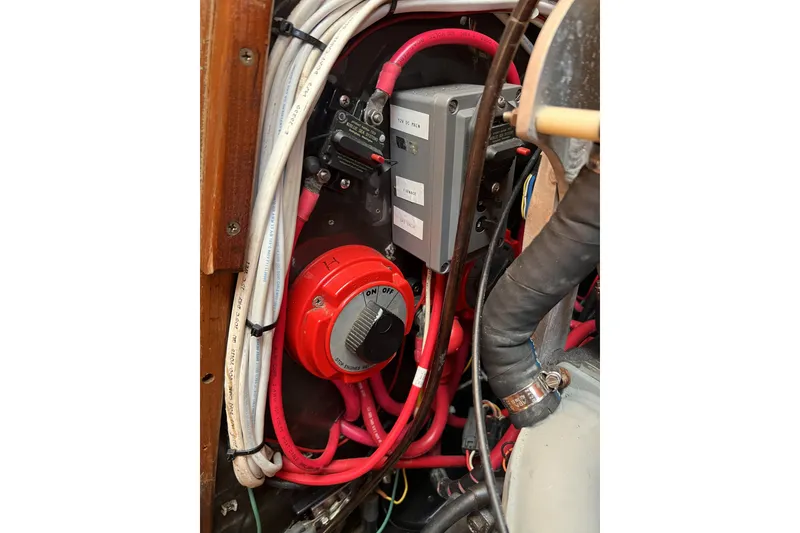 Slide: The Image of Electrical system of a 1981 Nordic Boats 40, featuring wiring and control components. - 58