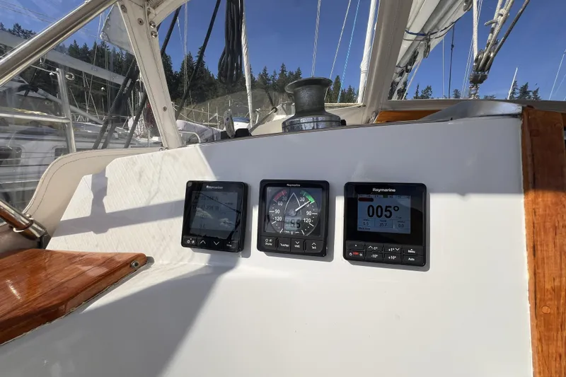 Slide: The Image of Cockpit of 1981 Nordic Boats 40 with Raymarine navigation instruments. - 24