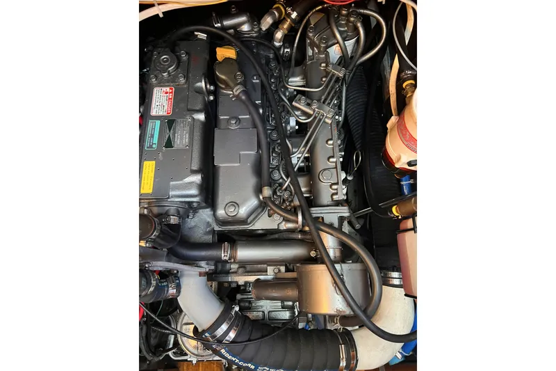 Slide: The Image of Engine of a 1981 Nordic Boats 40, showcasing intricate mechanical components. - 52