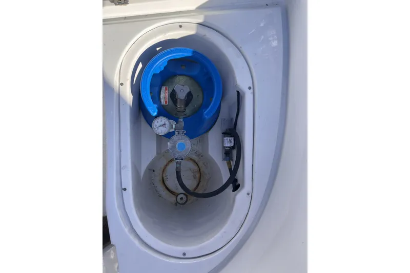 Slide: The Image of Propane tank compartment on a 1981 Nordic Boats 40. - 32