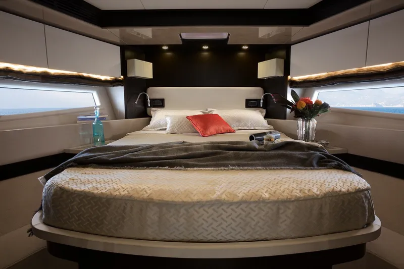 Slide: The Image of Luxurious bedroom interior of 2018 Azimut 66 yacht with elegant decor and ocean view. - 13