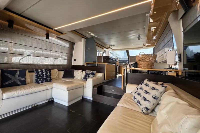 Slide: The Image of Luxurious interior of a 2018 Azimut 66 yacht with elegant seating and decor. - 14