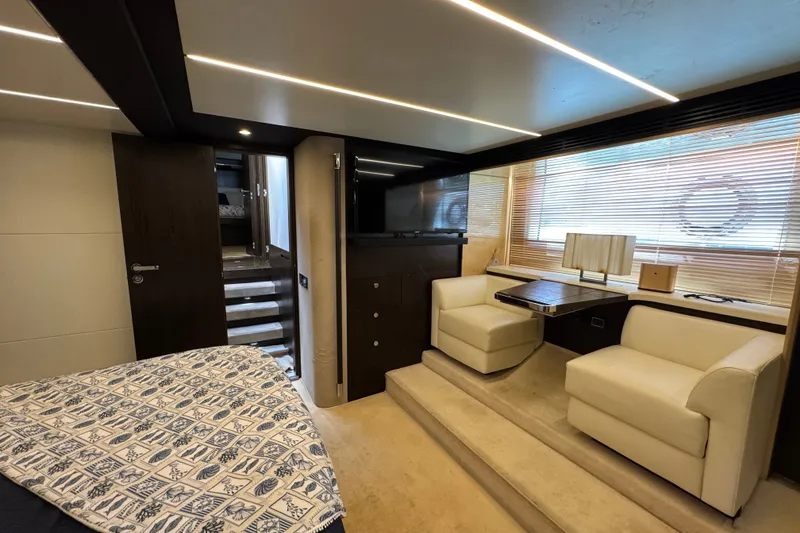 Slide: The Image of Luxurious interior of 2018 Azimut 66 yacht with modern seating and elegant decor. - 19