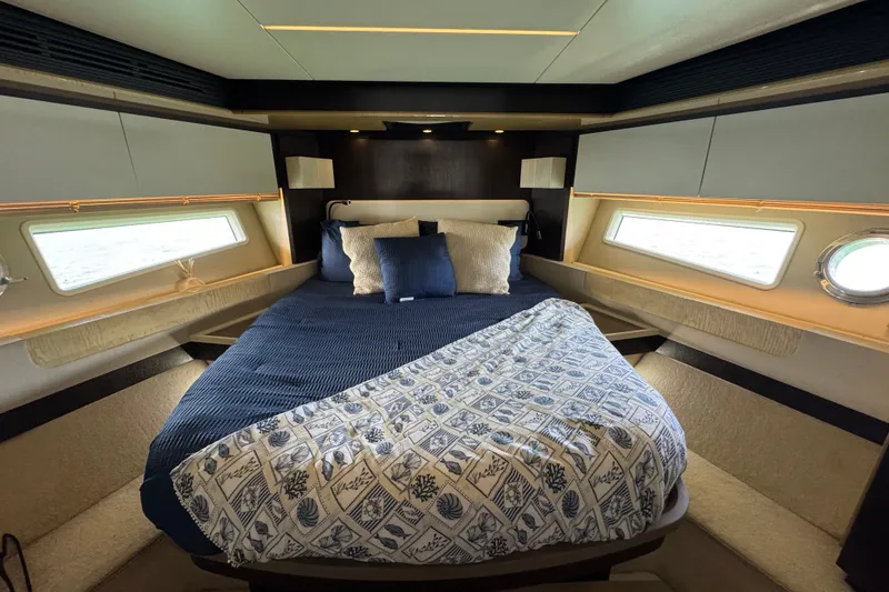 Slide: The Image of Luxurious bedroom interior of 2018 Azimut 66 yacht with elegant bedding and modern design. - 20