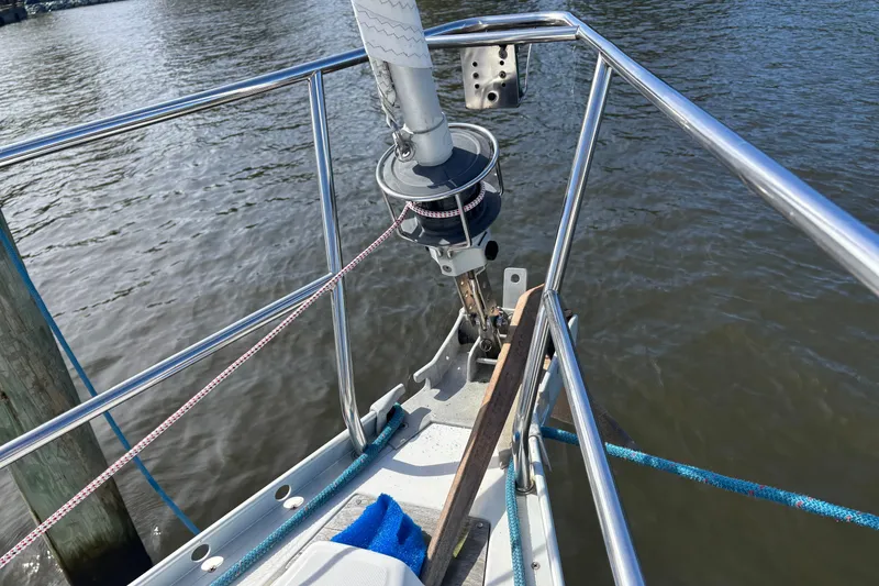 Slide: The Image of Bow of 1999 Beneteau 381 sailboat with stainless steel railing and winch. - 5