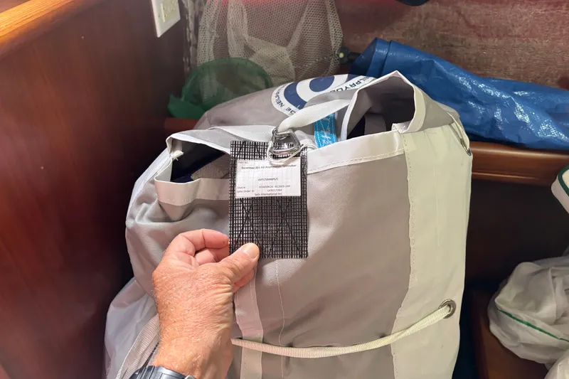 Slide: The Image of Bag with label inside a Beneteau 381 sailboat, 1999 model. - 19